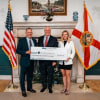Photo: President Richard Corcoran, Sen. Pat Neal and Vice Pres. of Advancement for  New College Foundation Sydney Gruters