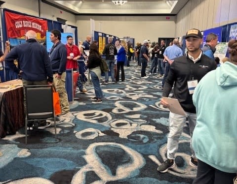 People networking at the CARVC trade show