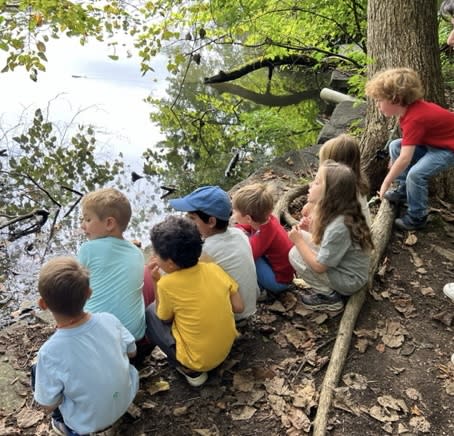 children overlooking Sheldrake pond