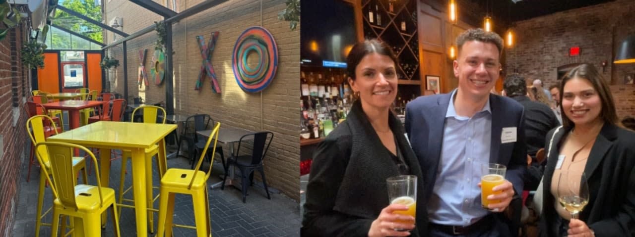 Outdoor patio with colorful seating and wall art; three young professionals smiling with drinks at an indoor networking event