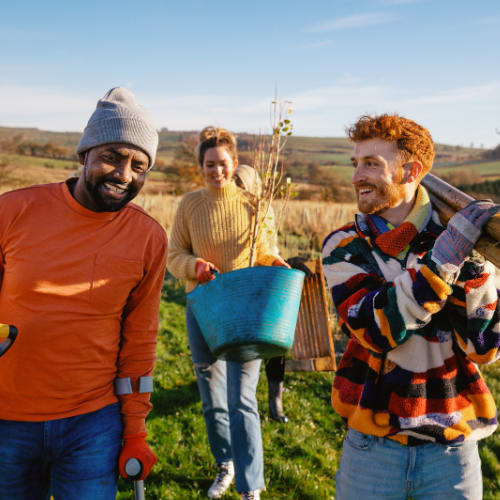 Three people work outside to help build a thriving Jefferson County.