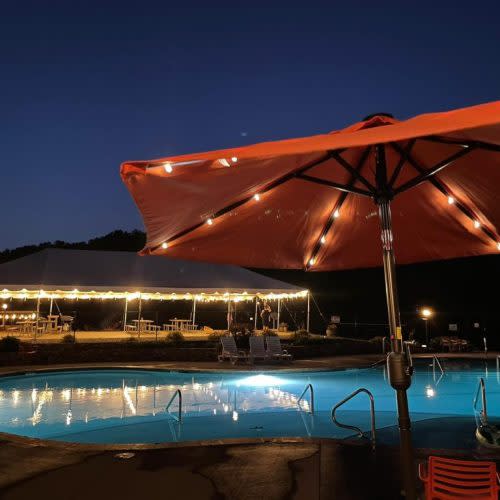 Emberglow Outdoor Resort pool at night