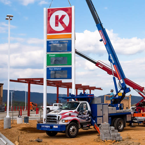 Gas station pricer sign under construction.