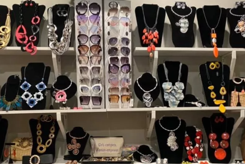 different sets of jewelry and sunglasses