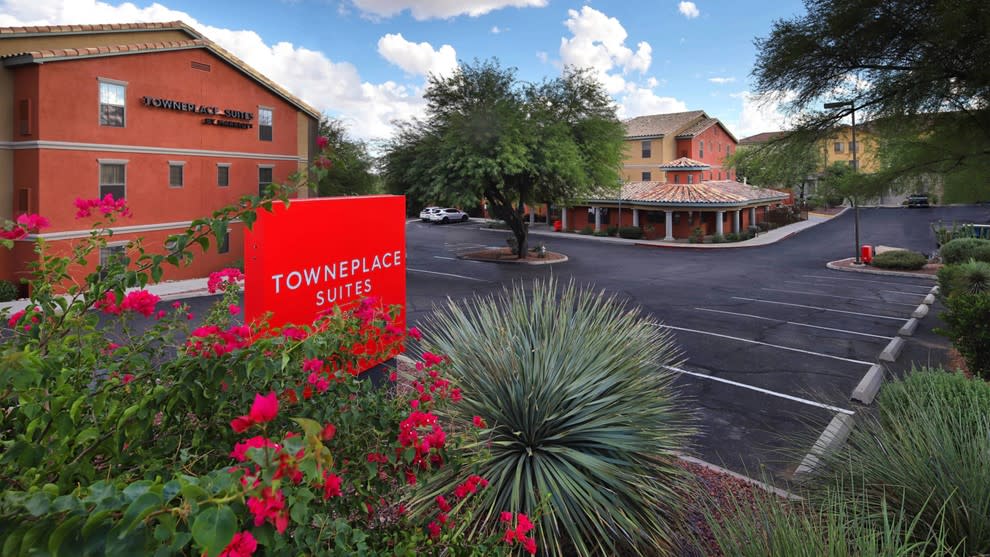 Exterior of TownePlace Suites Tucson with desert landscaping and welcoming entrance.