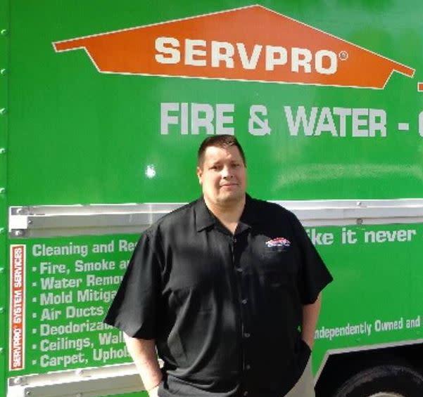 Paul Frost in front of a SERPVRO Box Truck.