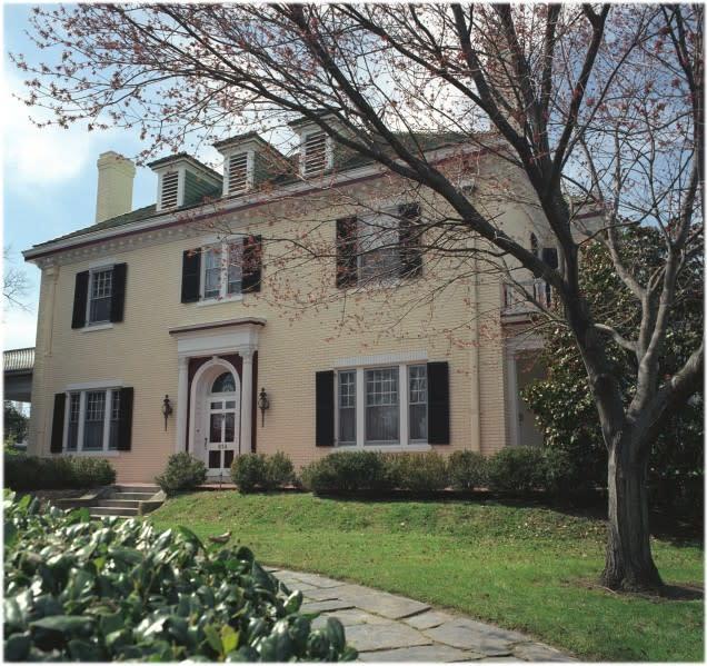 Front view of two story colonial brick Inn