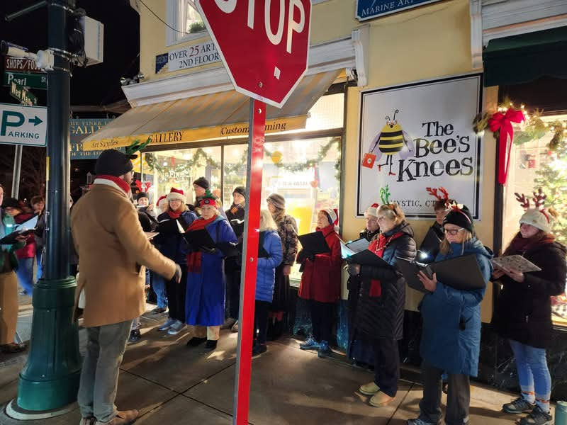 Members of the Mystic River Chorale performing carols during the Stroll.