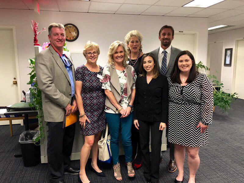 Home Care Day advocates with Mary Beth Vickers, a top health policy official in Governor DeSantis' office (third from left)