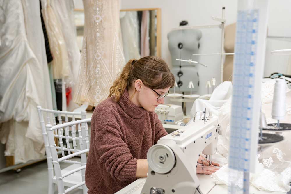 Working on a wedding dress alteration