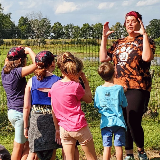 Tour being given to children.