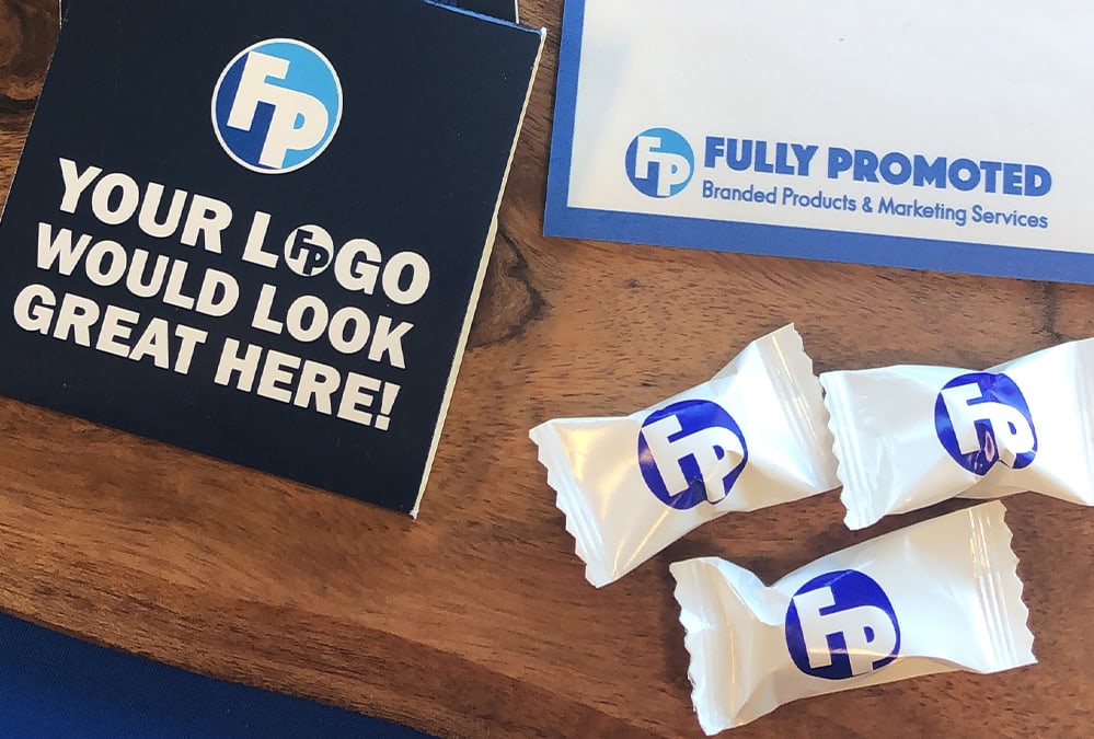 Notebooks and candy with your Logo