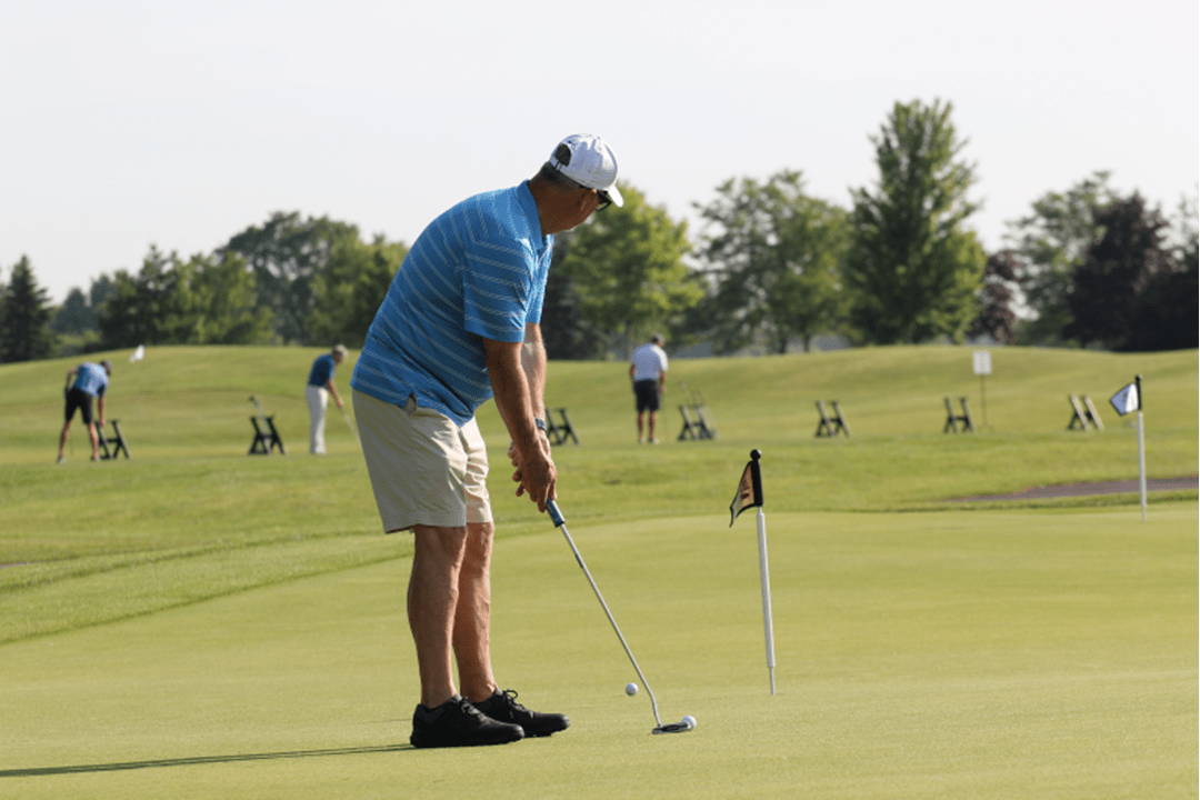 Golfer Practicing Before Tee-Time