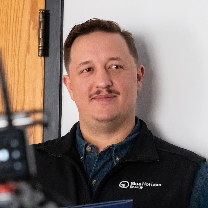 Portrait of Kyle Wyatt, Marketing Manager of Blue Horizon Energy