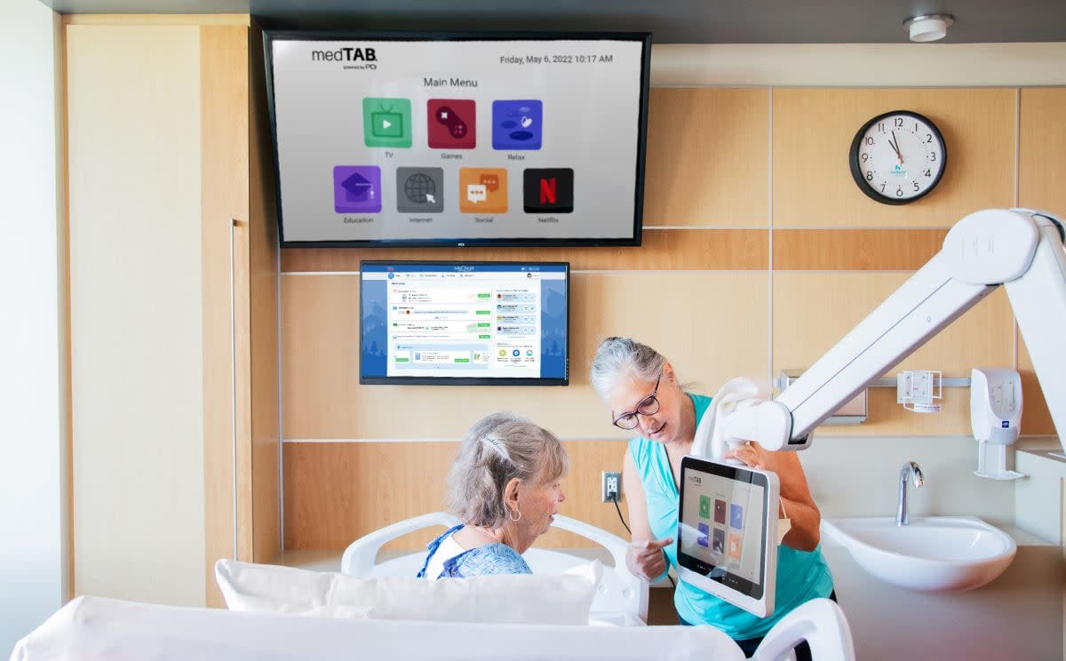 PDi Hospital TVs on Wall and Arm Mounted with Patient in Bed