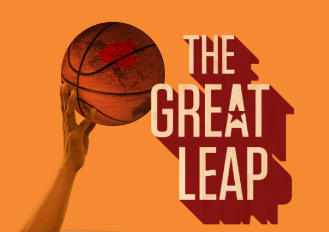 the great leap on an orange background image of a basketball with a map of Asia on it lifted by an arm