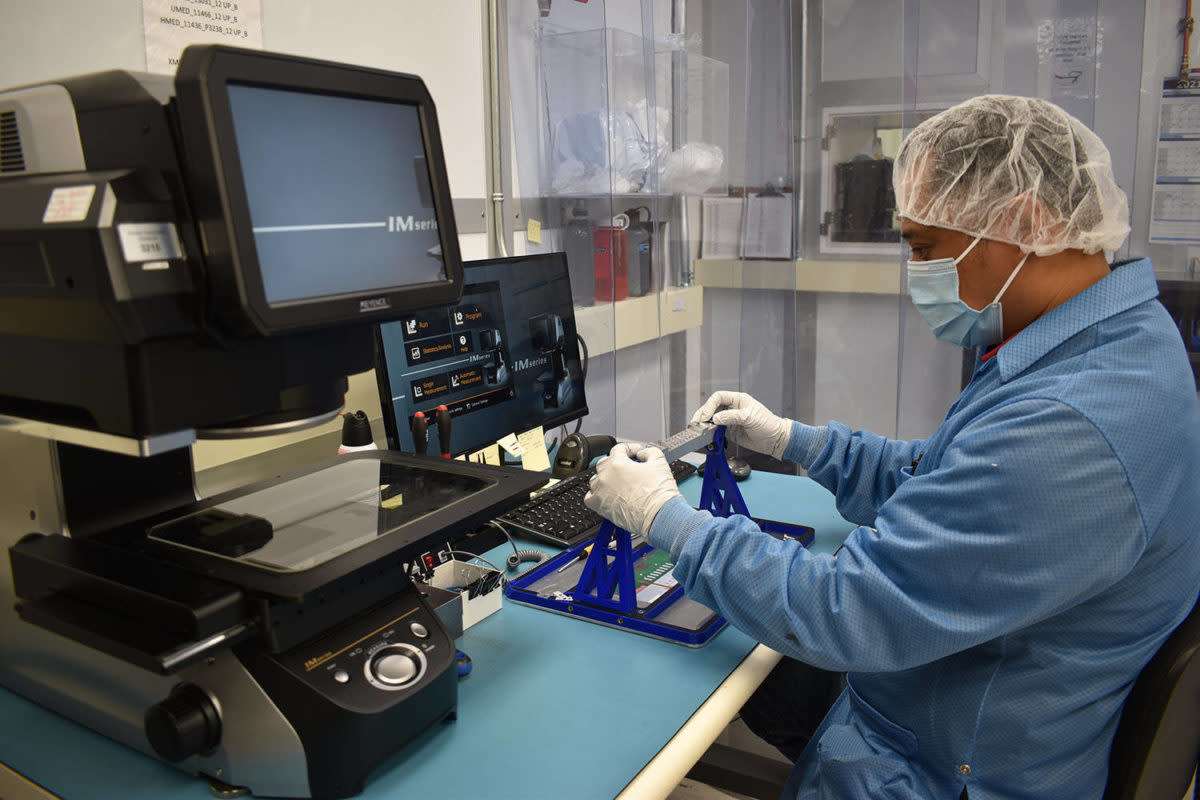 Dexter Macaisa, team lead for assembly process and development at Central Saanich’s Redlen Technologies, works on component o