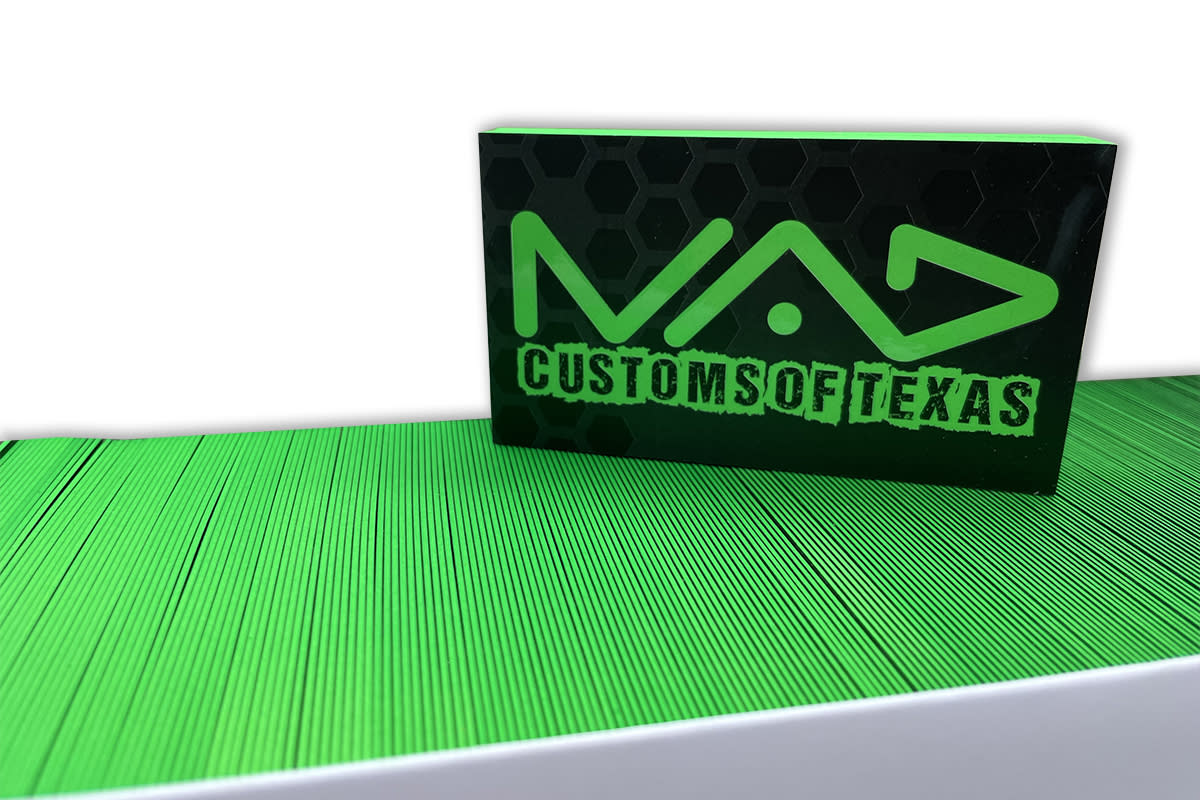 Neon green PMS-matched front and edges of business cards by Page by Page Graphic Design, LLC