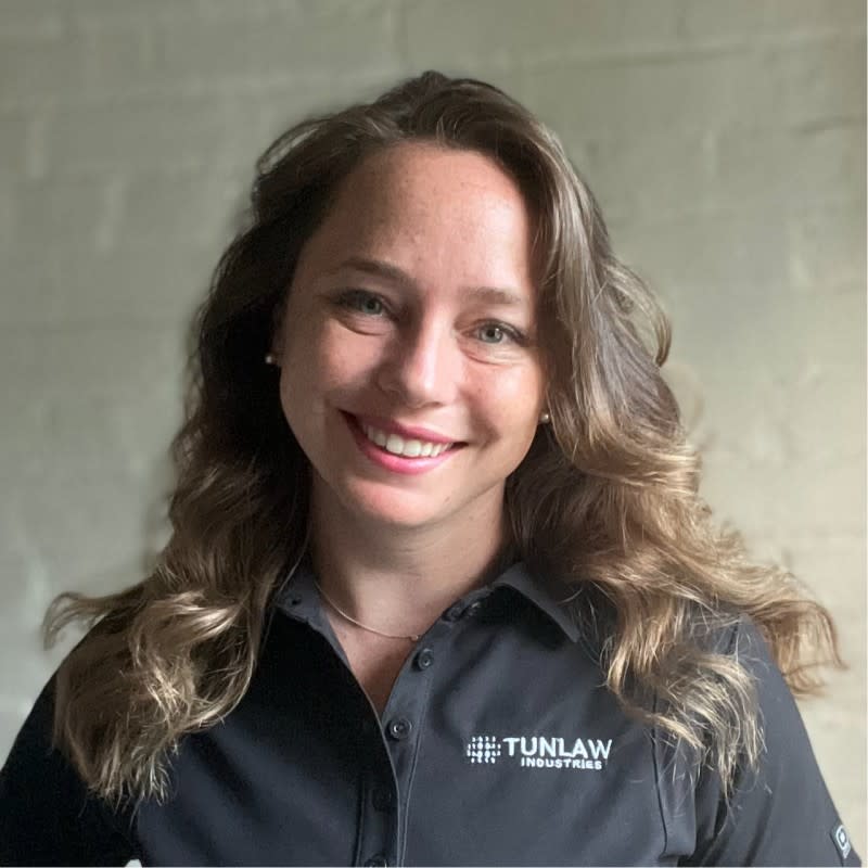 Headshot of Caitlin Lawrence, Founder