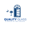 Quality Glass & Design window looking at palm tree.