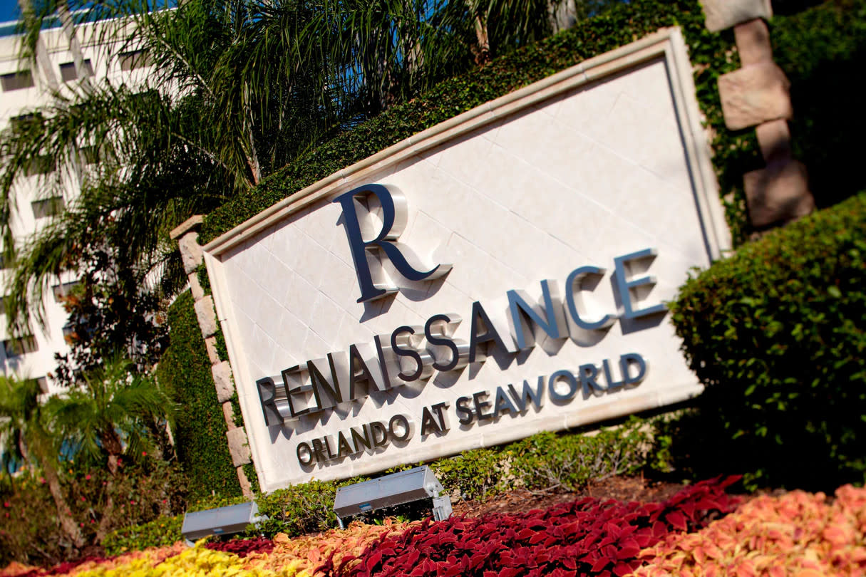 Outside Renaissance Orlando sign in flower bed