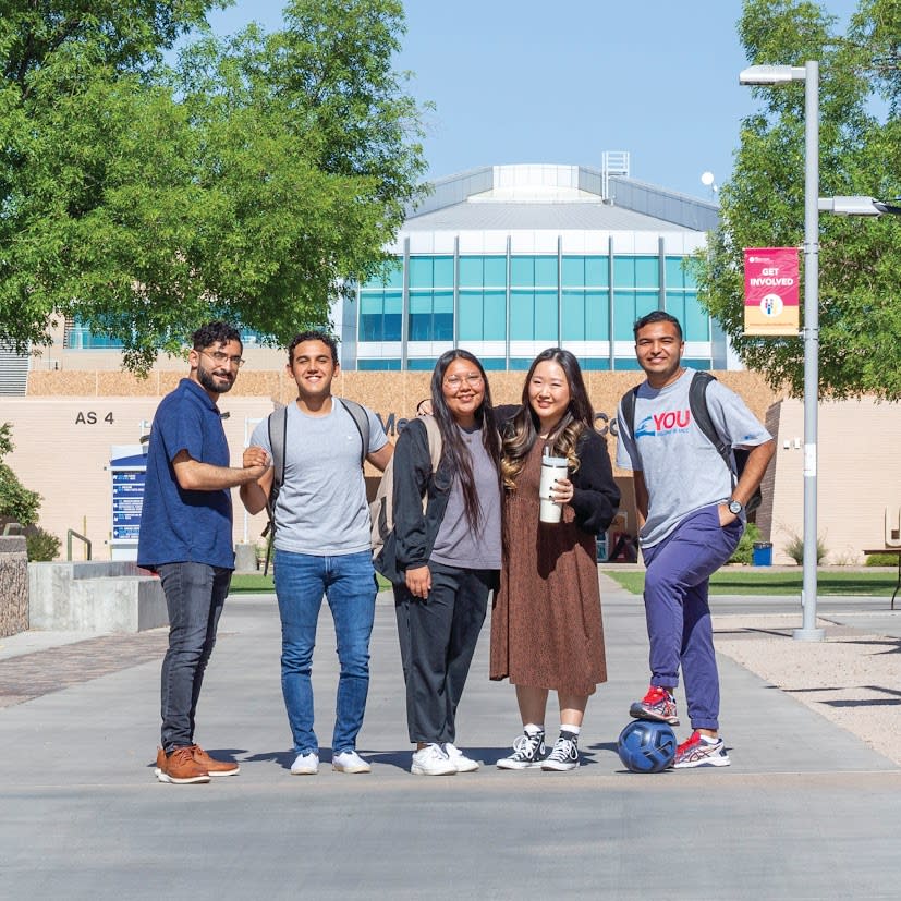 MCC students standing in front of library