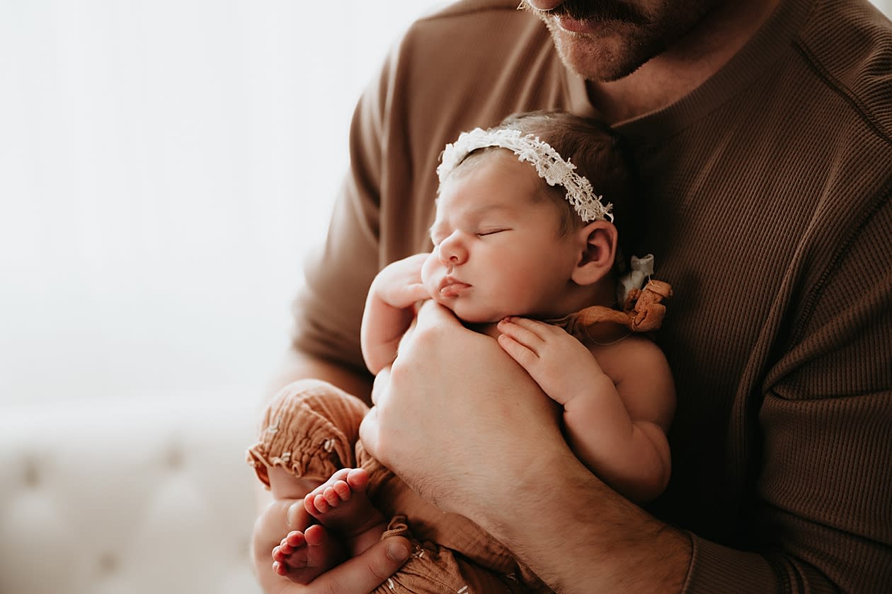 Newborn portrait of a dad and his daughter in Bellevue, WA