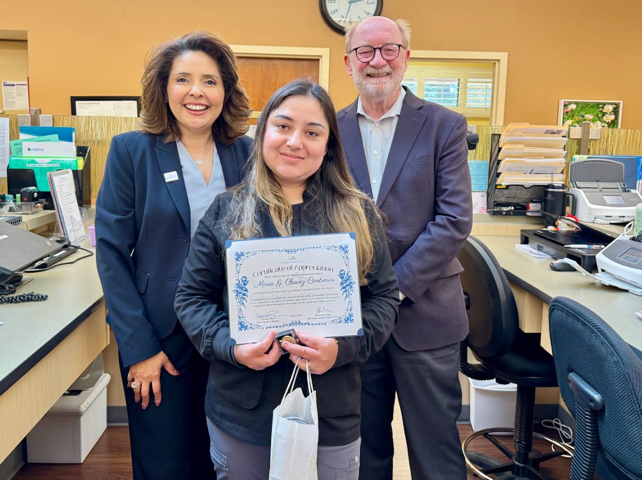 Ida Lopez Chan with Senator John Laird and Maria G. (Lupita) Chavez-Contreras who celebrates 20 years of service.