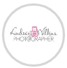 Professional photographer Lindsey Wilkins capturing a family portrait session outdoors with natural lighting.