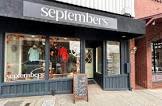 Septembers storefront and window with A-frame sign