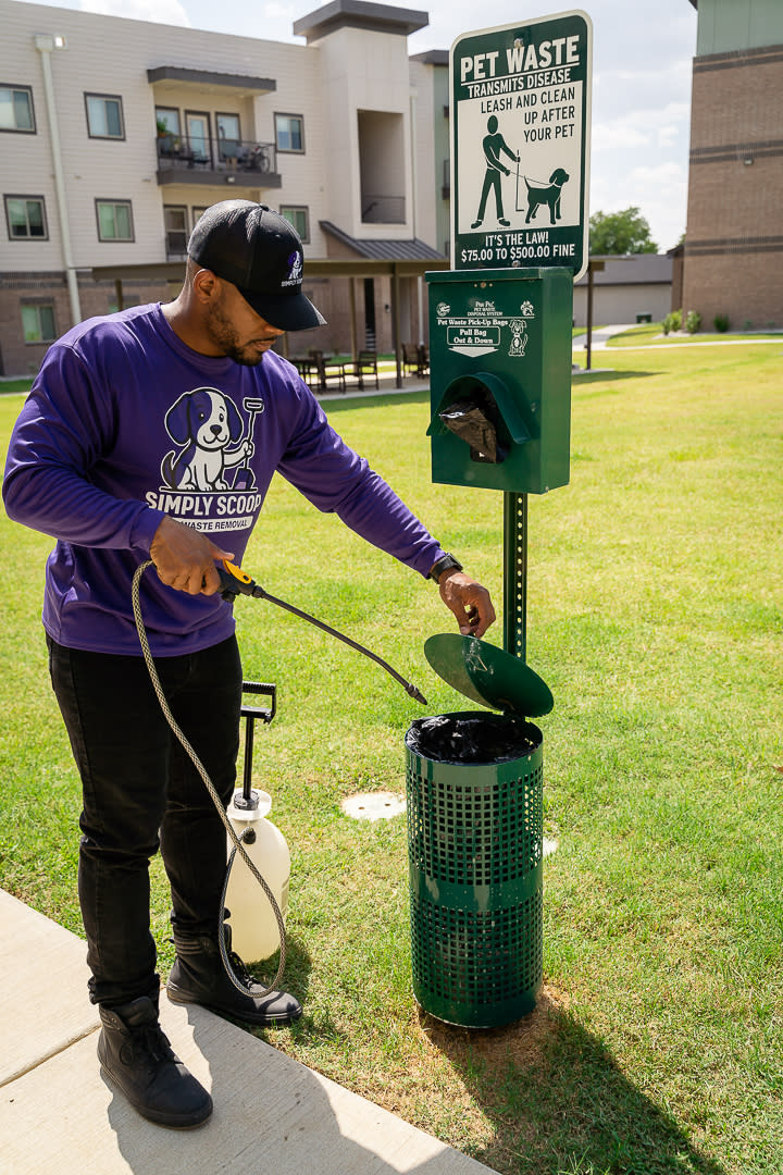 Simply Scoop technician providing professional pet waste removal and yard sanitation in Cleburne TX.