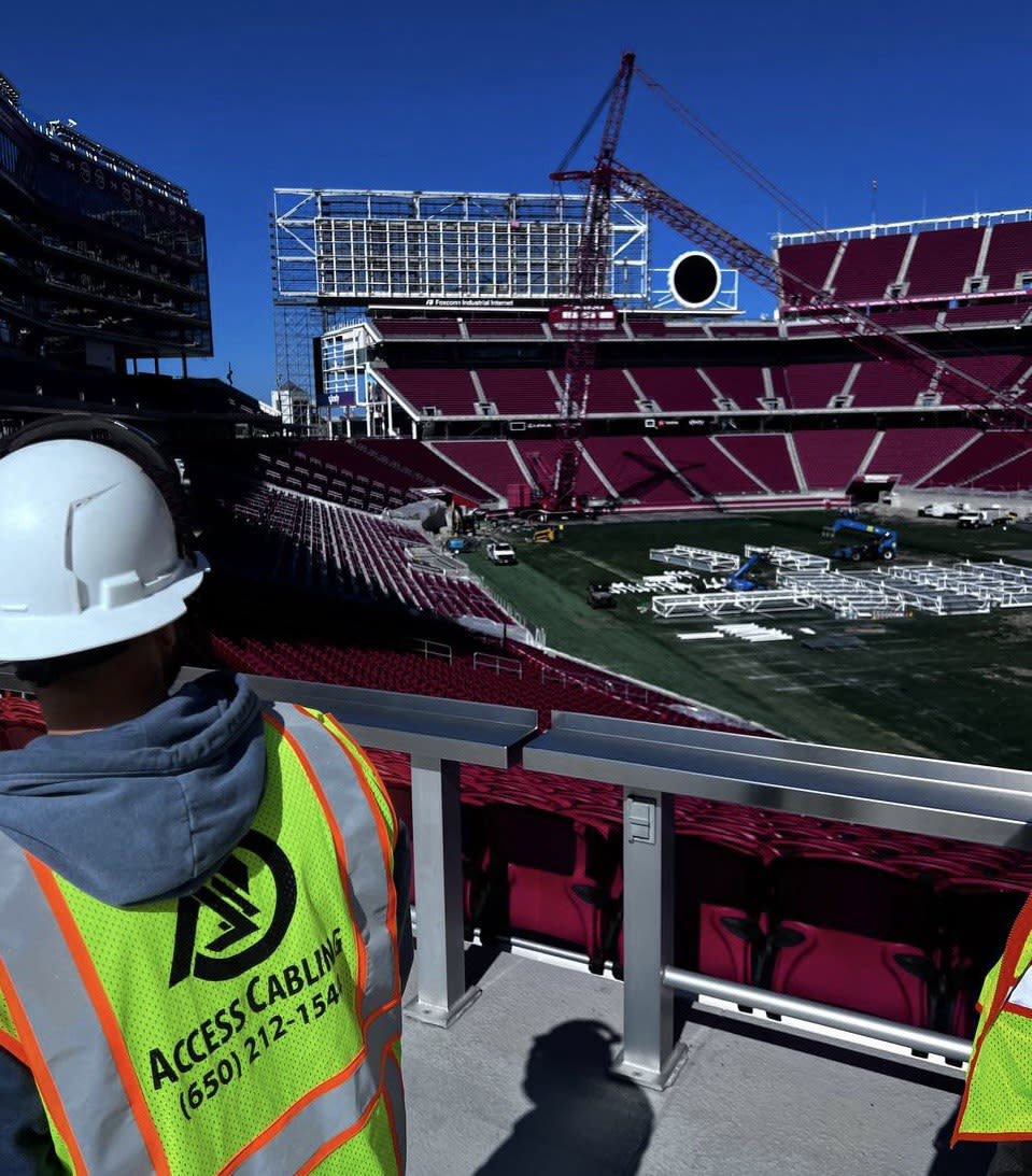 Access Cabling technicians installing structured cabling and fiber infrastructure inside Levi’s Stadium in Santa Clara, CA.