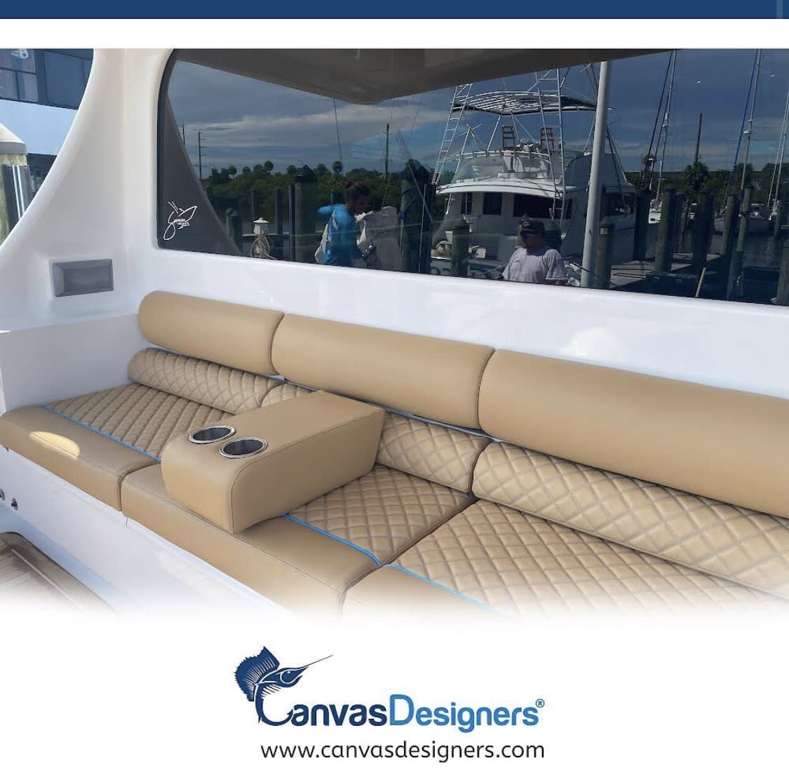 Custom marine upholstery with tan quilted diamond-stitch seating on a sport fishing boat by Canvas Designers
