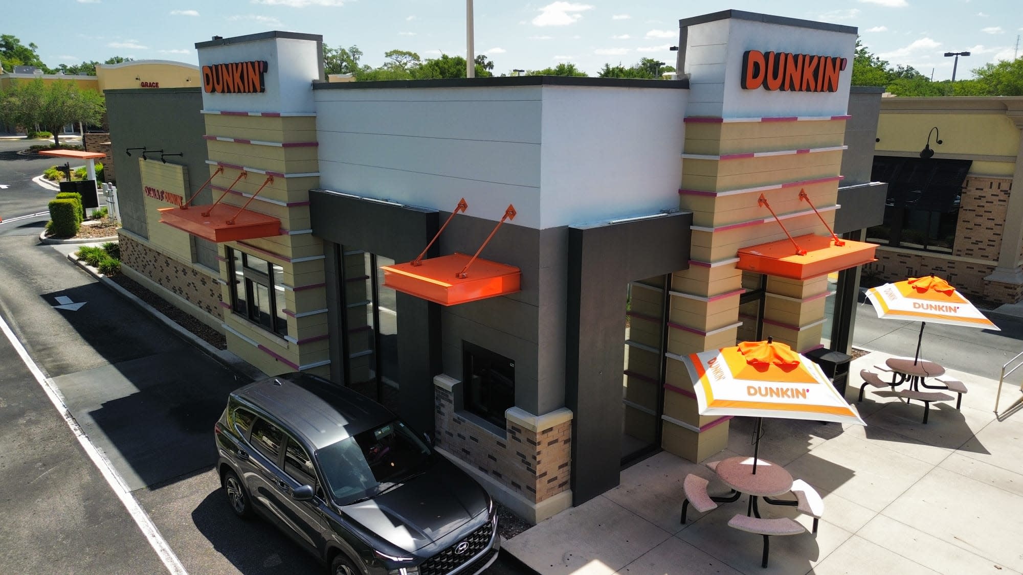 Commercial retail building repainting by Complete Structure Painting in Florida