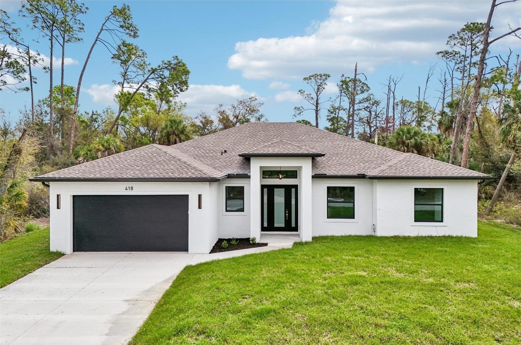 Completed single-family home built by Sosnin Builders in Port Charlotte, Florida