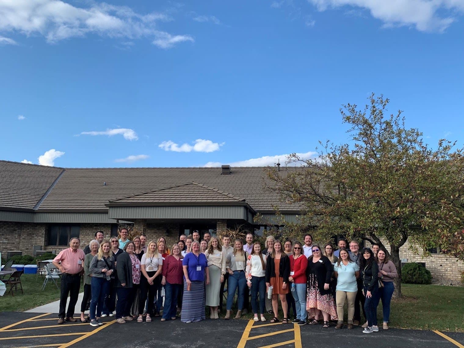KerberRose team members posing together for a group photo at the Oshkosh office.