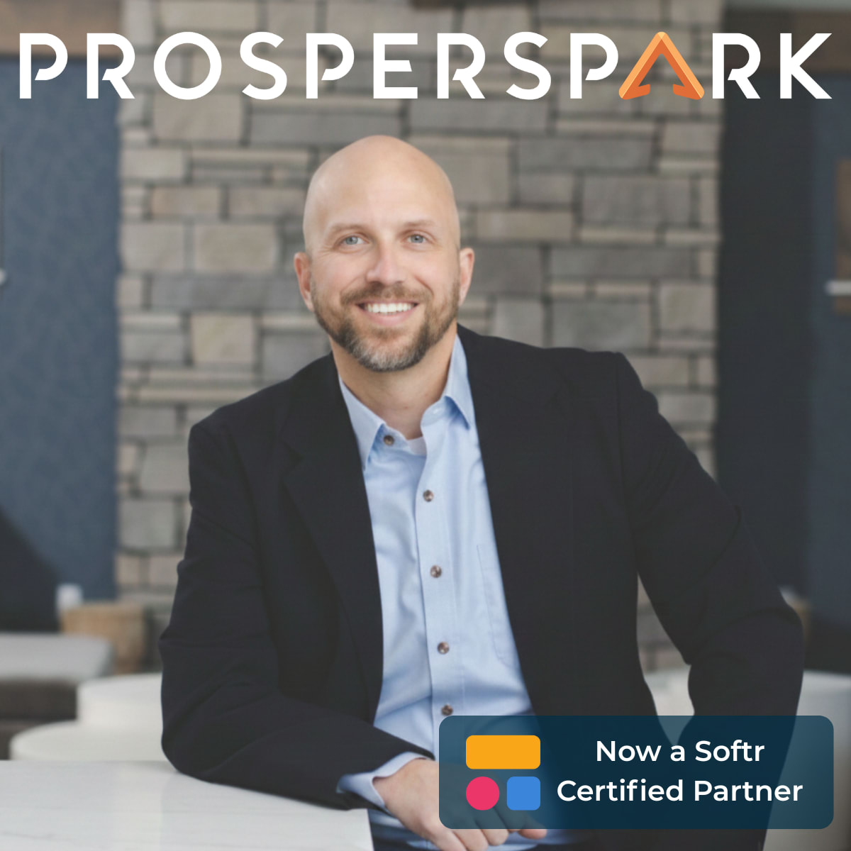 ProsperSpark banner with owner Brandon at a table; overlay badge reads ‘Now a Softr Certified Partner with the Softr logo.