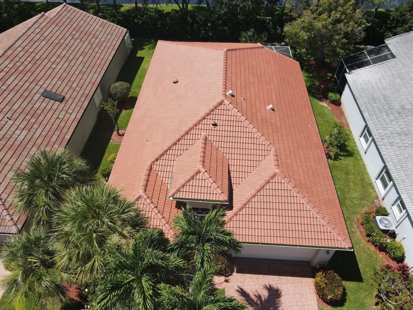 Drone view of a terracotta barrel tile roof on a single-story home in Boynton Beach