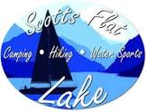 Scotts Flat Lake NID logo- camping, hiking, water sports with a sailboat and shades of blue mountains in the background
