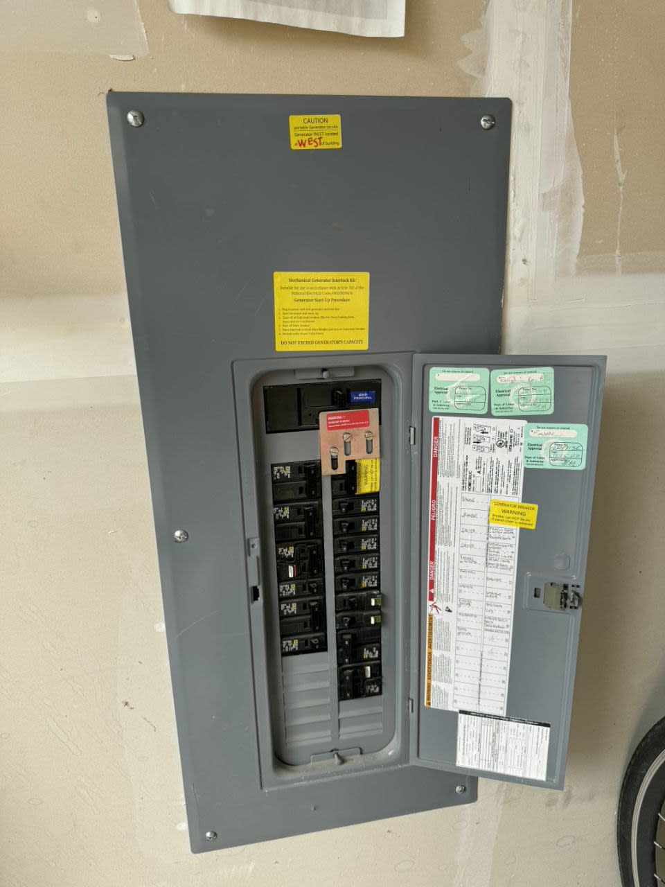 Electrical panel upgrade with generator interlock installed by Surge Electrical.
