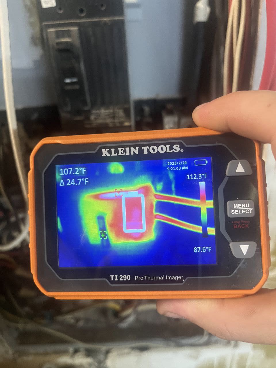 Thermal imaging used to detect overheating electrical components in a panel.
