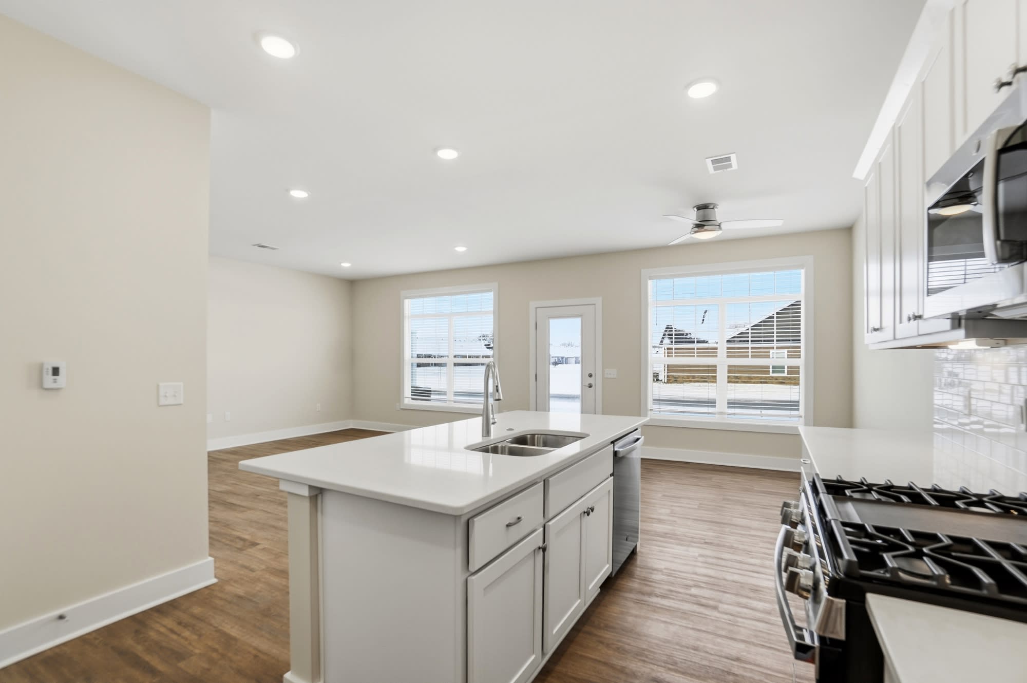 Open-concept Kitchen. Dining, and Living Spaces