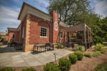 image shows COhatch Worthington - the Library from a side view where the patio is visible