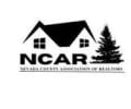 Nevada County Association of Realtors logo with a roof of house, two windows and a pine tree silhouetted
