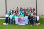 Pictured above are members of our Safety Committees, Senior Leadership and Board of Directors at the Flag Raising Ceremony