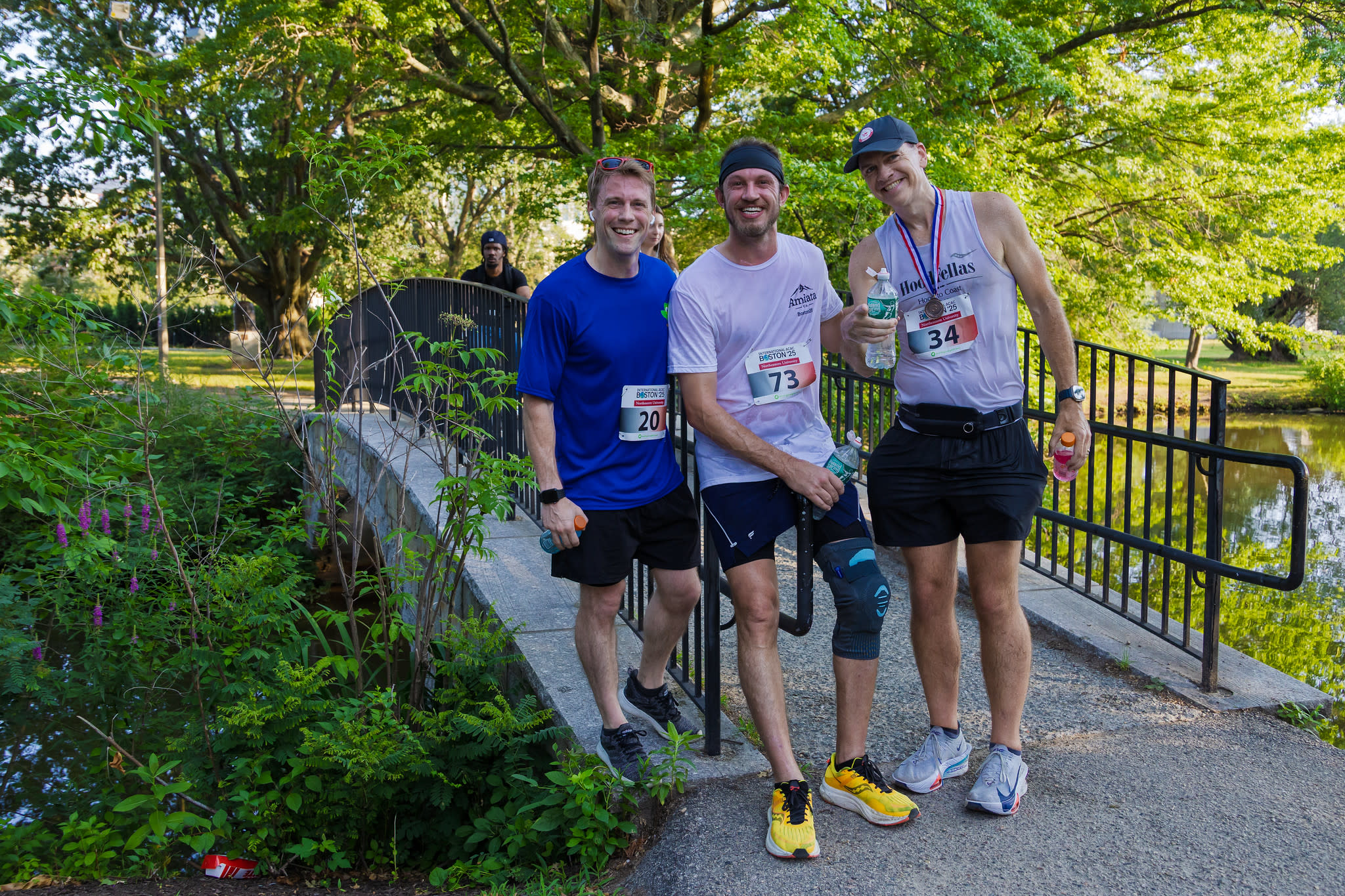 Three men smiling after the 5k