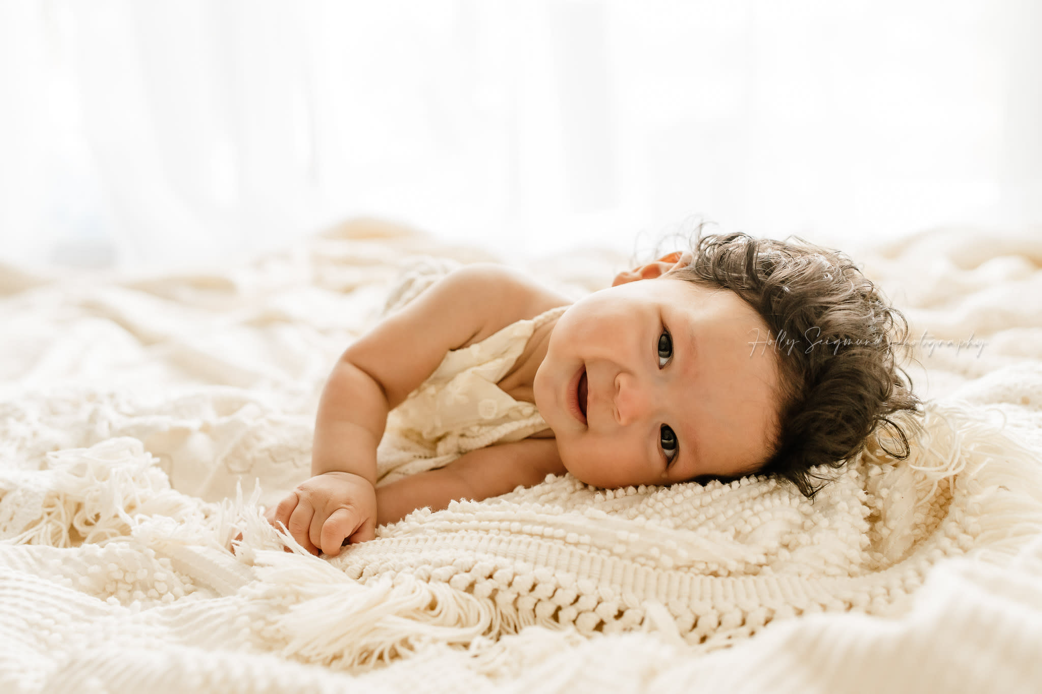6 month baby session on crochet in a white natural light studio