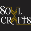 SoulCrafts logo- black, white lettering, the "U" and the "A" are gold and jewelry reminiscent