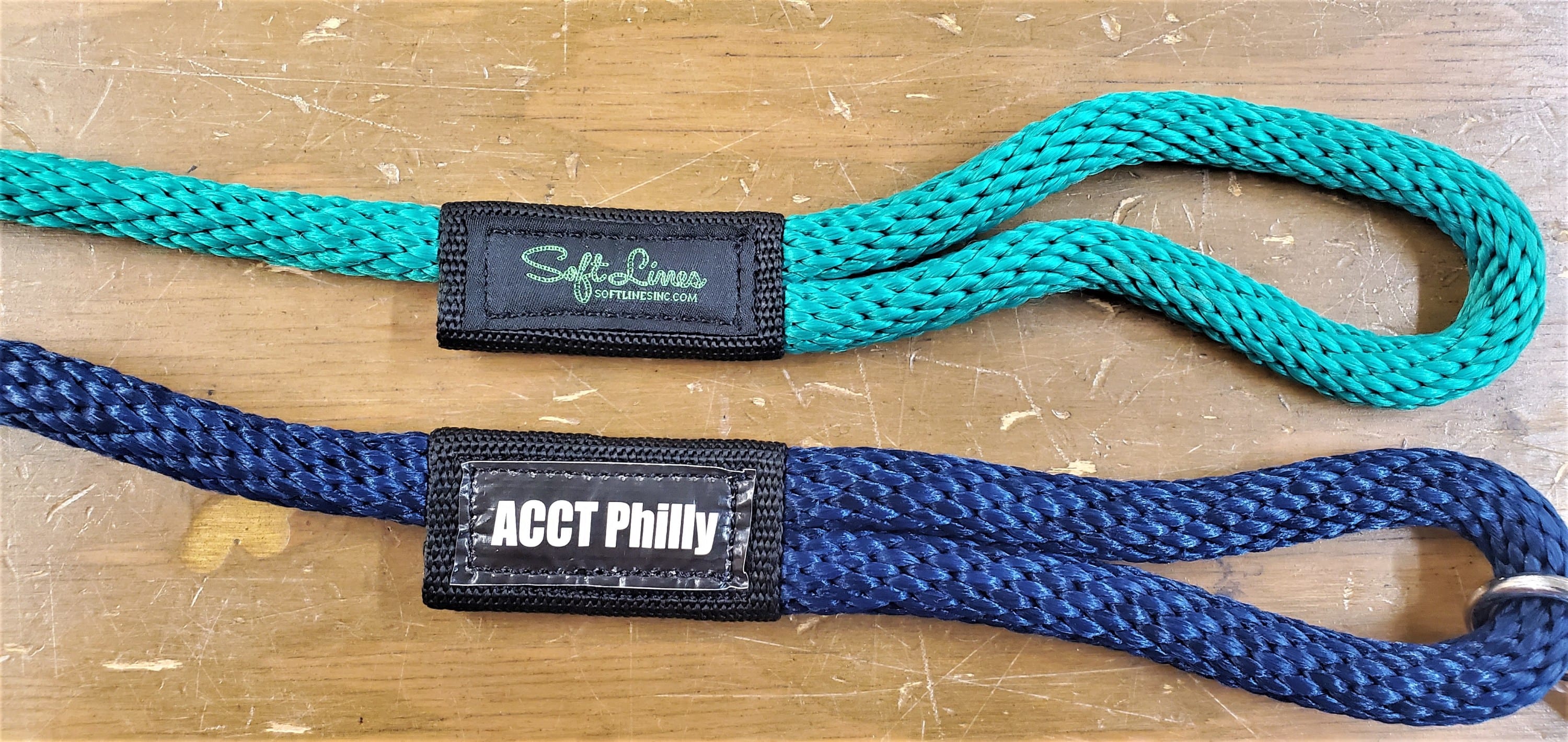 A picture of two of our leash handles with customized label text