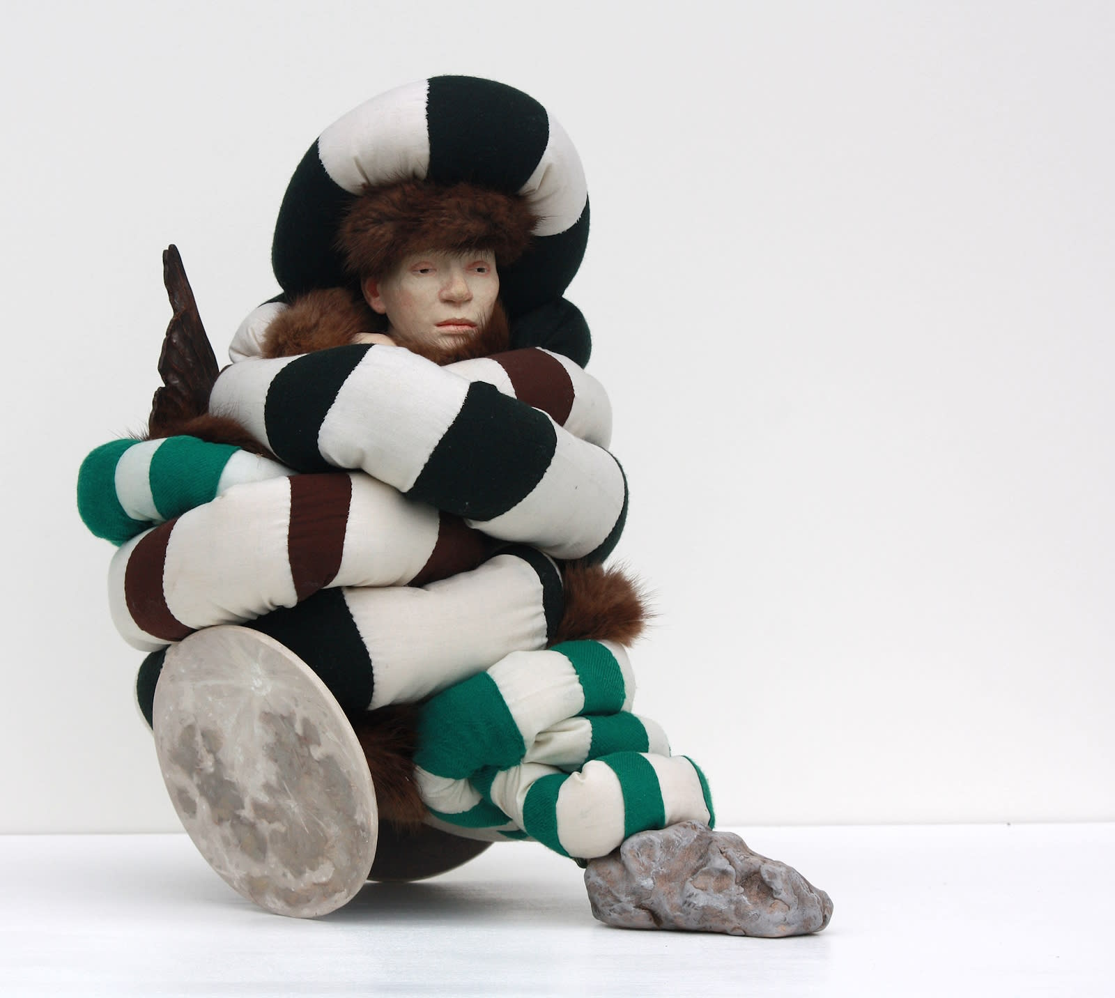 Image of Twist with Moons, Ceramic with reclaimed fur, fabrics, and oil paint on wood, 16” wide x 17” x 14”, by Amy J. Dyck